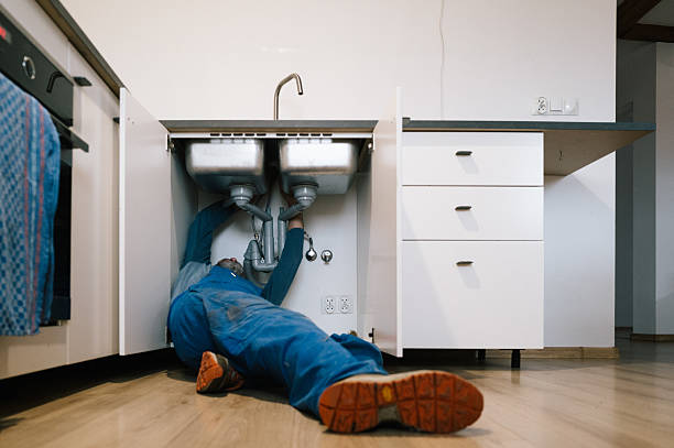 Professional Drain Cleaning technician working in Raymond, OH